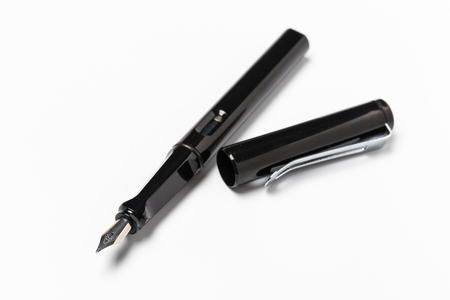 Black fountain pen isolated on white backgroundの写真素材