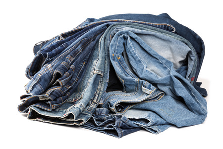 Blue jeans isolated on white background, jeans stackedの写真素材