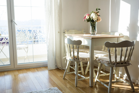 Nicely decorated living ( lunch ) room. Dining table and some chairs.の写真素材