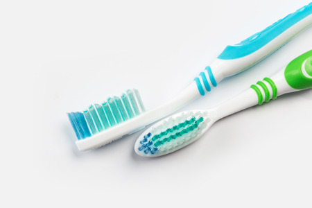 two new toothbrush on white background. dental conceptの写真素材