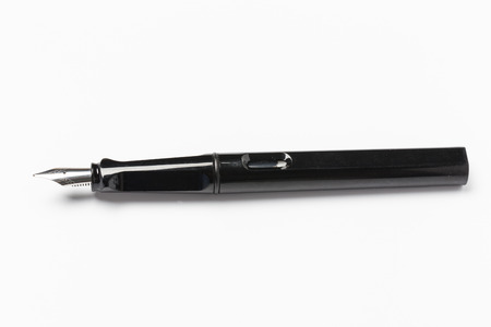 Black fountain pen isolated on white backgroundの写真素材