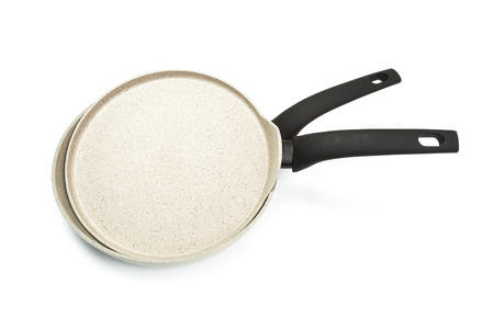 Photo of a bright ceramic pan with a black handle, isolated on a white background. Studio shotの写真素材