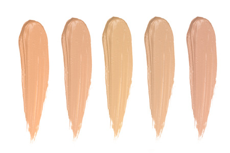 Shades of foundation On White Background. Closeup of different tones of liquid foundation.Cosmetic smear of liquid isolated on white backgroundの写真素材