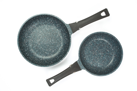 Photo of ceramic frying pan isolated on white background. Studio shotの写真素材