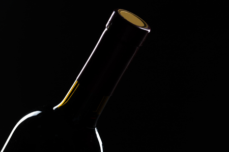 Template concept  wine bottle for your design and advertising company promotion your of product on black background with copy space. Wine bottle mockup.の写真素材