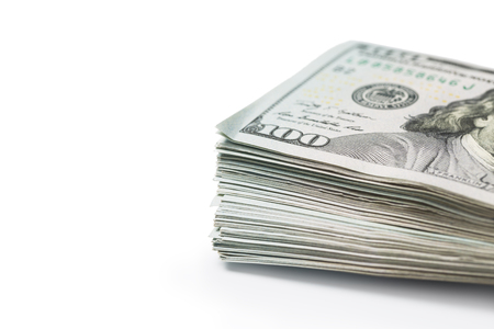 Many dollar banknotes on white background. National American currencyの写真素材
