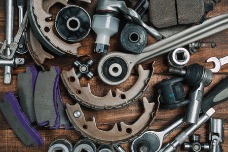 Various car parts  
 on wooden backgroundの写真素材