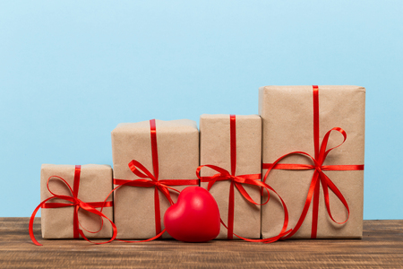 Festive gift box on blue background. Festive greeting card.の写真素材