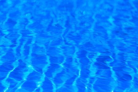 surface of blue swimming pool,background of water in swimming poolの写真素材