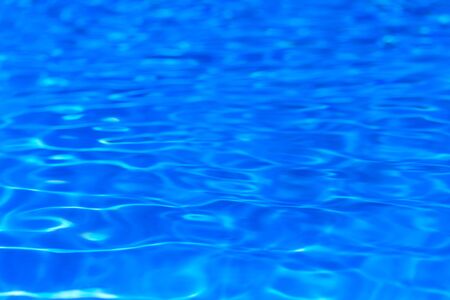 surface of blue swimming pool,background of water in swimming pool