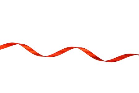 Red satin ribbon isolated on white backgroungの写真素材