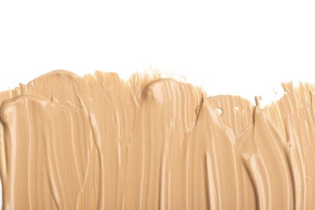 Close up of smear beige and ligth pink tone foundation texture for background.の写真素材