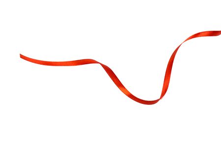 Red satin ribbon isolated on white backgroungの写真素材