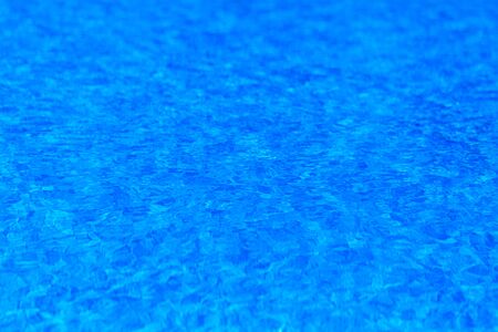 surface of blue swimming pool,background of water in swimming poolの写真素材