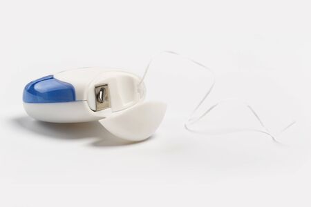 dental floss isolated on a white background.の写真素材