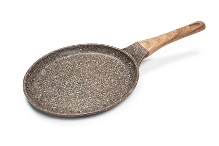 Photo of a ceramic frying pan with a wooden handle isolated on a white background.の写真素材