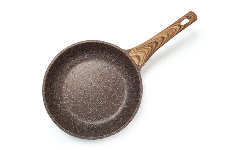 Photo of a ceramic frying pan with a wooden handle isolated on a white background.の写真素材