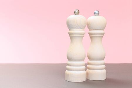 salt and pepper shaker on gray boardの写真素材
