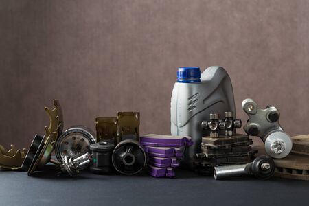 New car parts on a gray background closeup. Shop for autoの写真素材