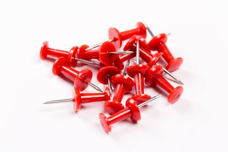 set of red push pins isolated on white background.