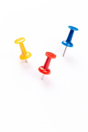 set of colorful push pins isolated on white background.