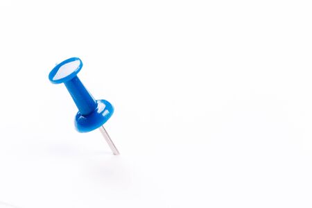 close up of a blue pushpin on white background with clipping pathの写真素材