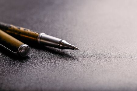 automatic plastic ballpoint pen with clipping path on black background. close up.の写真素材