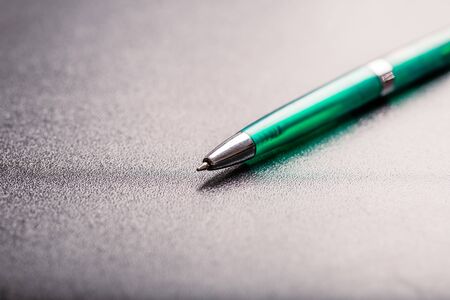 automatic plastic ballpoint pen with clipping path on black background. close up.の写真素材