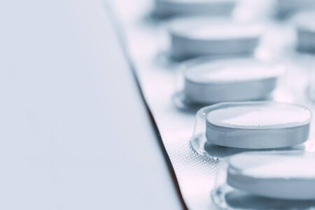 Pills in blister packs isolated on white background