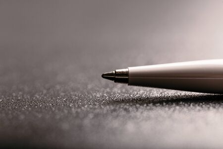 automatic plastic ballpoint pen with clipping path on black background. close up.の写真素材