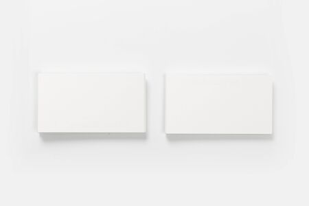 Mockup of business cards at white textured background.の写真素材