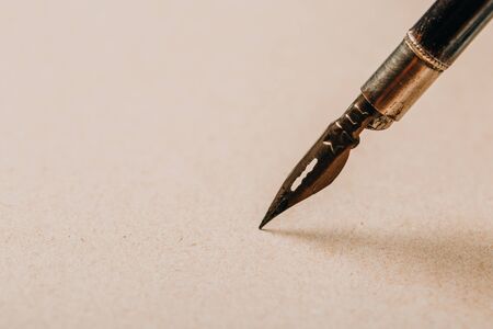 fountain pen on old paper. Vintage. toned photoの写真素材