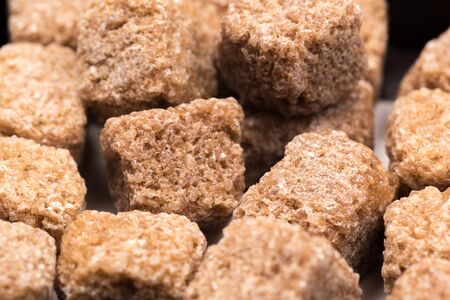 brown sugar isolated on white background. Top view. Flat lay