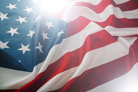 American flag waving in the wind. Flag USA as a patriotic background