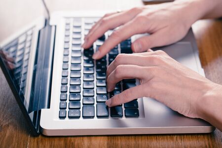 hands of women who use laptop keyboard Concept of email delivery and online technology usage