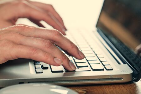 hands of women who use laptop keyboard Concept of email delivery and online technology usage