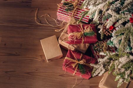 Christmas and New Year decorations with lights.Christmas tree and gift boxes left by santa claus