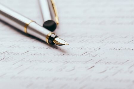 fountain pen on paper with ink text closeup