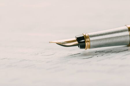 fountain pen on paper with ink text closeup