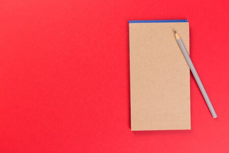 Sketchbook on colorful background. Copy space. top view of blank open notebook, concept of education...