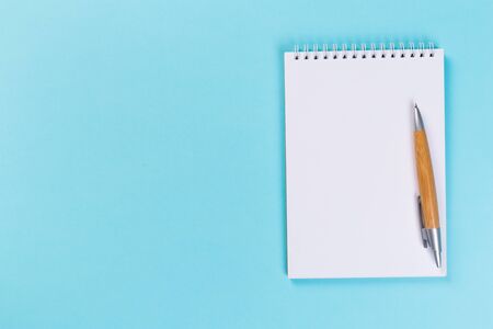 Sketchbook on colorful background. Copy space. top view of blank open notebook, concept of education...
