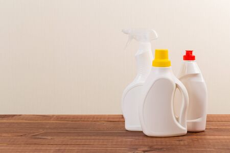 set of cleaning products on the table on a colored background.の写真素材