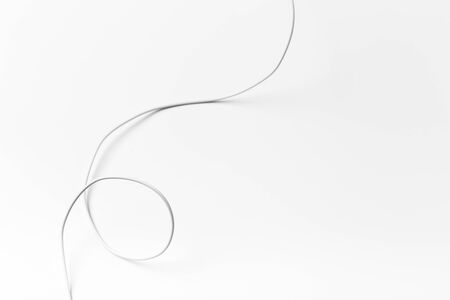 white new wire cable isolated on a white background の写真素材