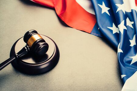 the judge gavel and background with usa flagの写真素材
