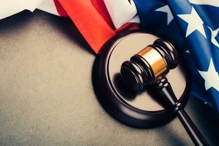 the judge gavel and background with usa flagの写真素材