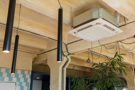 modern glass and metal loft lamps in a design office