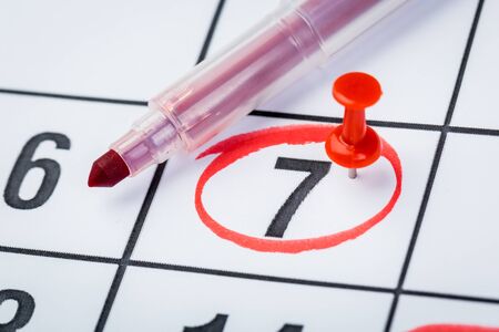 2020 calendar page with pen. important date markedの写真素材