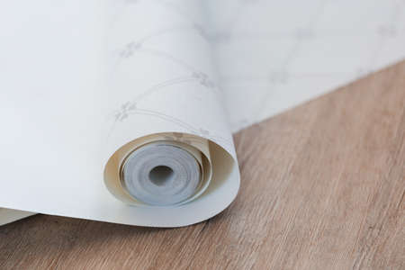 fashionable modern wallpaper on a wooden table in the room