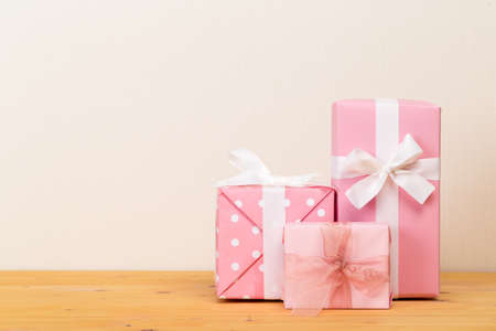 Christmas gift boxes on bokeh light background. Holiday Greeting Card.の写真素材