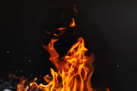 burning firewood in a barbecue or barbecue.の写真素材